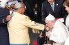 Pope Francis kisses the hand of residential school survivor Alma Desjarlais of the Frog Lake First Nation as Chief Greg Desjarlais (left) looks on as he arrives in Edmonton on Sunday, July 24, 2022. His visit to Canada is aimed at reconciliation with Indigenous people for the Catholic Church's role in residential schools.THE CANADIAN PRESS/Nathan Denette