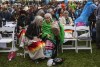 Indigenous people gather to see Pope Francis on his visit to Maskwacis, Alta. during his papal visit across Canada on Monday, July 25, 2022. THE CANADIAN PRESS/Jason Franson