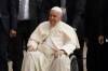 Pope Francis waves as he leaves the parish community of Sacred Heart after a meeting with Indigenous peoples Monday, July 25, 2022, in Edmonton, Alberta. (AP Photo/Eric Gay)