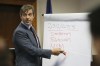 Alex Jones' lawyer Andino Reynal gives his opening statement to the jury, Tuesday, July 26, 2022, at the Travis County Courthouse in Austin, Texas. (Briana Sanchez/Austin American-Statesman via AP, Pool)