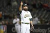 Oakland Athletics pitcher Lou Trivino celebrates after the Athletics defeated the Houston Astros in a baseball game in Oakland, Calif., Tuesday, July 26, 2022. (AP Photo/Jeff Chiu)