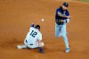 Seattle Mariners' J.P. Crawford (3) throws out New York Yankees' Aaron Hicks at first base after forcing out Isiah Kiner-Falefa (12) for a double play during the sixth inning of a baseball game Tuesday, Aug. 2, 2022, in New York. (AP Photo/Frank Franklin II)
