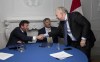 Conservative leadership candidate Roman Baber shakes hands with Jean Charest and Scott Aitchison following the debate, Wednesday, August 3, 2022 in Ottawa. THE CANADIAN PRESS/Adrian Wyld