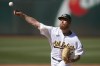 Oakland Athletics starting pitcher Adam Oller delivers against the San Francisco Giants during the second inning of a baseball game, Saturday, Aug. 6, 2022, in Oakland, Calif. (AP Photo/D. Ross Cameron)