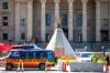 MIKAELA MACKENZIE / WINNIPEG FREE PRESS
People, who appear to be related to the Freedom Convoy, gather on the legislative grounds with a teepee and parked vehicles in Winnipeg.