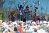 JOHN WOODS / WINNIPEG FREE PRESS
Gangstagrass, Trio Svin and Tall Tall Trees perform on the Snowberry Field Stage Sunday at the Winnipeg Folk Festival.