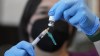 FILE - A registered nurse prepares a dose of a Monkeypox vaccine at the Salt Lake County Health Department Thursday, July 28, 2022, in Salt Lake City. U.S. health officials on Tuesday, Aug. 9, 2022, authorized a new monkeypox vaccination strategy designed to stretch limited supplies by allowing health professionals to vaccinate up to five people — instead of one — with each vial. (AP Photo/Rick Bowmer, File)