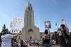 FILE - Protesters line the street around the front of the Nebraska State Capitol during an Abortion Rights Rally held on July 4, 2022, in Lincoln, Neb. A Nebraska woman has been charged in early June with helping her teenage daughter end her pregnancy at about 24 weeks after investigators uncovered Facebook messages in which the two discussed using medication to induce an abortion and plans to burn the fetus afterward. (Kenneth Ferriera/Lincoln Journal Star via AP, File)