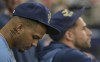 Tampa Bay Rays' Wander Franco, left, and Kevin Kiermaier, both on the injured list, sit in the dugout during the third inning of a baseball game against the Baltimore Orioles, Sunday, Aug. 14, 2022, in St. Petersburg, Fla. (AP Photo/Steve Nesius)