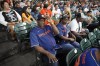 The parents of Houston Astros' Yordan Alvarez, Agustín Eduardo Álvarez Salazar, left, and Mailyn Cadogan Reyes watch the Minnesota Twins and Houston Astros play a baseball game Tuesday, Aug. 23, 2022, in Houston. Alvarez's parents got to see him play as a professional for the first time Tuesday night after arriving from Cuba Friday. (AP Photo/David J. Phillip)