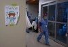 A health-care worker walks past a thank you sign in the intensive care unit at the Humber River Hospital during the COVID-19 pandemic in Toronto on January 25, 2022. A new survey suggests there is a significant decrease in the well-being of physicians across Canada as many doctors say their mental health is worse now than before the COVID-19 pandemic. The Canadian Medical Association's new National Physician Health Survey indicates 53 per cent of respondents report symptoms of burnout including emotional exhaustion and depersonalization. THE CANADIAN PRESS/Nathan Denette