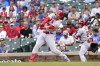 St. Louis Cardinals' Nolan Gorman hits an RBI single off Chicago Cubs starting pitcher Marcus Stroman, scoring Paul Goldschmidt, during the first inning of a baseball game Thursday, Aug. 25, 2022, in Chicago. (AP Photo/Charles Rex Arbogast)