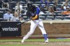New York Mets' Starling Marte hits a triple to score Mark Canha and James McCann against the Colorado Rockies during the fifth inning of a baseball game on Friday, Aug. 26, 2022, in New York. (AP Photo/Jessie Alcheh)