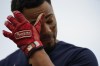 Boston Red Sox's Xander Bogaerts reacts after hitting a flyout to right field during the first inning of a baseball game against the Minnesota Twins, Monday, Aug. 29, 2022, in Minneapolis. (AP Photo/Abbie Parr)