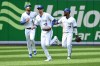 Toronto Blue Jays, from left, Lourdes Gurriel Jr., Bradley Zimmer and Teoscar Hernandez run in from the outfield after defeating the Detroit Tigers in American League baseball action in Toronto, Sunday, July 31, 2022. Outfielder Zimmer and relief pitcher Casey Lawrence have been added to the Toronto Blue Jays roster.THE CANADIAN PRESS/Jon Blacker