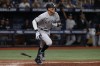 New York Yankees' Aaron Judge watches his home run against the Tampa Bay Rays during the ninth inning of a baseball game Saturday, Sept. 3, 2022, in St. Petersburg, Fla. (AP Photo/Scott Audette)
