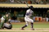 Atlanta Braves' Michael Harris II (23) watches an RBI single in front of Oakland Athletics catcher Sean Murphy, left, during the fifth inning of a baseball game in Oakland, Calif., Tuesday, Sept. 6, 2022. (AP Photo/Jed Jacobsohn)
