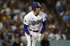 Los Angeles Dodgers' Freddie Freeman reacts after hitting an RBI-single during the sixth inning of a baseball game against the San Diego Padres, Saturday, Sept. 3, 2022, in Los Angeles. (AP Photo/Marcio Jose Sanchez)