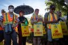 Members of the British Columbia General Employees' Union picket outside a B.C. Liquor Distribution Branch facility, in Delta, B.C., on Monday, Aug. 15, 2022.. Public service workers in British Columbia say they have reached a tentative contract agreement with the province. THE CANADIAN PRESS/Darryl Dyck