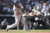 Chicago White Sox's Jose Abreu hits an RBI single against the Seattle Mariners during the sixth inning of a baseball game Wednesday, Sept. 7, 2022, in Seattle. (AP Photo/Caean Couto)