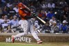 Cincinnati Reds' Aristides Aquino hits a home run against the Chicago Cubs during the third inning of a baseball game Wednesday, Sept. 7, 2022, in Chicago. (AP Photo/Matt Marton)