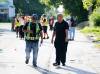 JOHN WOODS / WINNIPEG FREE PRESS 
                                Justice minister Kelvin Goertzen (right) toured the community with Bear Clan executive director Kevin Walker and other volunteers on Tuesday after announcing $100,000 in annual funding for the organization.