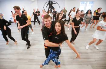 JOHN WOODS / WINNIPEG FREE PRESS
                                Leo Lopez and his daughter Ana Karen Lopez instruct a salsa class in their downtown studio.