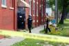 Winnipeg police at a Jarvis Avenue apartment block on Monday, where they found Danielle Dawn Ballantyne's body. (Mike Deal / Winnipeg Free Press files)