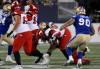 Shayne Gauthier takes down Stampeders QB Jake Maier for a crucial sack late in Thursday&rsquo;s game at IG Field. (John Woods / The Canadian Press)