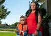 ETHAN CAIRNS / WINNIPEG FREE PRESS
                                Karly Mooney and her son Kane, 6, have had a hard time being able to book swimming lessons..