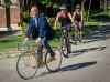 Kelly Morton photo
Mayoral candidate Rick Shone rides his bike while campaigning on Wednesday. The bike was stolen the same day.