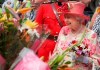 Queen Elizabeth II greets the crowd gathered outside Queen's Park in Toronto on Tuesday July 6, 2010 as she ends her nine-day visit to Canada before flying to New York to address the United Nations THE CANADIAN PRESS/Chris Young