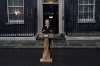 British Prime Minister Liz Truss delivers a statement regarding the death of Queen Elizabeth II outside Downing Street in London, Thursday, Sept. 8, 2022. Queen Elizabeth II, Britain's longest-reigning monarch and a rock of stability across much of a turbulent century, died Thursday after 70 years on the throne. She was 96. (AP Photo/Alberto Pezzali)