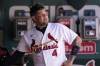 St. Louis Cardinals' Yadier Molina stands in the dugout after hitting his second home run of a baseball game against the Washington Nationals during the fourth inning Thursday, Sept. 8, 2022, in St. Louis. Molina also homered in the second. (AP Photo/Jeff Roberson)