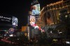 Images of Queen Elizabeth II on casino marquees are reflected by glass along the Las Vegas Strip, Thursday, Sept. 8, 2022, in Las Vegas. Queen Elizabeth II, Britain's longest-reigning monarch and a rock of stability across much of a turbulent century, died Thursday after 70 years on the throne. She was 96. (AP Photo/John Locher)