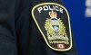 A Winnipeg Police Service shoulder badge is seen on an officer during a news conference at the Public Information Office in Winnipeg, Sept. 2, 2021. THE CANADIAN PRESS/David Lipnowski