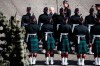 Britain's King Charles inspects an honour guard at the Palace of Holyroodhouse, following the death of Britain's Queen Elizabeth, Edinburgh, Scotland, Monday Sept. 12, 2022. King Charles III will accompany the queen coffin on a solemn procession through the cobbled streets of the Scottish capital from the royal Palace of Holyroodhouse to St. Giles' Cathedral, where members of the public will be able to pay their respects. (Phil Noble/pool photo via AP)