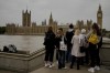 Tourists stand outside of Westminster Place in London, Tuesday, Sept. 13, 2022. Queen Elizabeth II, Britain's longest reigning monarch, will lay in state at Westminster Palace from Wednesday. THE CANADIAN PRESS/AP/Markus Schreiber