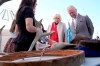 Prince Charles, right, and Camilla, Duchess of Cornwall, second from right, look at a display of traditional hunting tools and clothing after arriving in Yellowknife, Northwest Territories, during part of the Royal Tour of Canada, Thursday, May 19, 2022. Some Indigenous leaders and community members say they're concerned about making progress on reconciliation with King Charles III. THE CANADIAN PRESS/Paul Chiasson