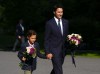 Prime Minister Justin Trudeau and son Hadrien arrive to place flowers for Queen Elizabeth II prior to a ceremony to proclaim the accession of the new Sovereign, King Charles III, at Rideau Hall, in Ottawa, Saturday, Sept. 10, 2022. Trudeau has declared Sept. 19 a federal holiday to mourn Queen Elizabeth II on the day of her state funeral in London. THE CANADIAN PRESS/Sean Kilpatrick