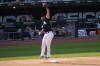 Chicago White Sox first baseman Jose Abreu is unable to field the high throw from shortstop Elvis Andrus during the sixth inning of a baseball game against the Colorado Rockies Wednesday, Sept. 14, 2022, in Chicago. (AP Photo/Charles Rex Arbogast)