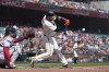San Francisco Giants' Austin Wynns hits an RBI single against the Atlanta Braves during the second inning of a baseball game in San Francisco, Wednesday, Sept. 14, 2022. (AP Photo/Godofredo A. Vásquez)