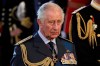 Britain's King Charles reacts as the coffin of Britain's Queen Elizabeth II arrives at Westminster Hall from Buckingham Palace for her lying in state, in London, Britain, Wednesday, Sept. 14, 2022. (Alkis Konstantinidis/Pool photo via AP)