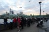 People wait in a queue along the South Bank to pay their respect to the late Queen Elizabeth II during the Lying-in State, at Westminster Hall, in London, England, Friday, Sept. 16, 2022. The Queen will lie in state in Westminster Hall for four full days before her funeral on Monday Sept. 19. (AP Photo/Petr David Josek)