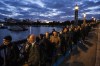 People stand in a queue to pay their respects to the late Queen Elizabeth II during the Lying-in State, outside Westminster Hall in London, Thursday, Sept. 15, 2022. The Queen will lie in state in Westminster Hall for four full days before her funeral on Monday Sept. 19. (AP Photo/Nariman El-Mofty)