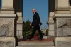 Premier John Horgan makes his way back to his office after his visit to the Hall of Honour to sign a book of condolence for Queen Elizabeth II while at the legislature in Victoria, B.C., on Monday, September 12, 2022. Dignitaries including the premier and Lt.-Gov. Janet Austin have joined a commemorative service in honour of Queen Elizabeth II in the capital city named after her great-great-grandmother.THE CANADIAN PRESS/Chad Hipolito