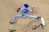 New York Mets starter Max Scherzer throws during the first inning of a baseball game against the Milwaukee Brewers Monday, Sept. 19, 2022, in Milwaukee. (AP Photo/Morry Gash)