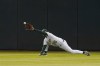 Oakland Athletics center fielder Cristian Pache catches a line drive hit by Seattle Mariners' Cal Raleigh during the fifth inning of a baseball game in Oakland, Calif., Wednesday, Sept. 21, 2022. (AP Photo/Jeff Chiu)