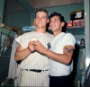 FILE - New York Yankees slugger Roger Maris poses with fan Sal Durante in the locker room at Yankee Stadium, Oct. 1, 1961, after hitting his 61st home run of the season. Durante caught Maris' fourth inning home run into the right field seats as Maris broke Babe Ruth's single-season home run record. If Aaron Judge passes Roger Maris, some lucky fan might become this generation's Sal Durante. (AP Photo/File)