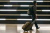 A commuter walks in Union Station in Toronto on Friday, Sept. 16, 2022. Some workers are raising concerns about returning to office buildings as infectious disease experts warn of a potentially large wave of new COVID-19 cases this fall. THE CANADIAN PRESS/Alex Lupul